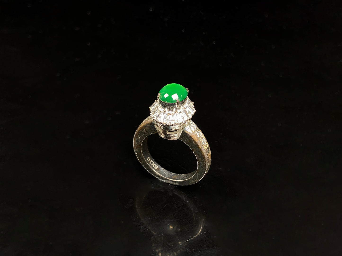 A enchanting imperial green jadeite ring.