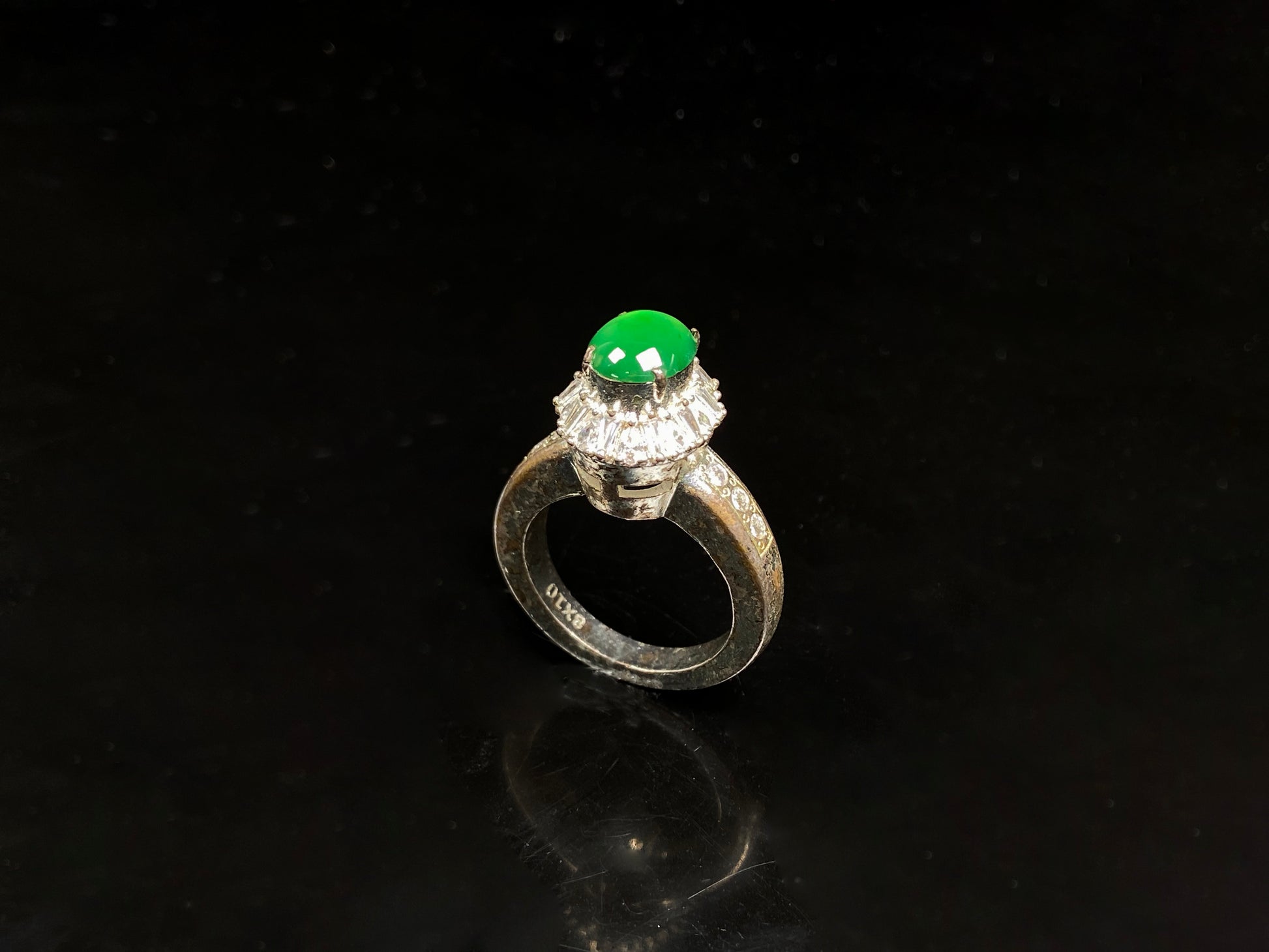 A enchanting imperial green jadeite ring.