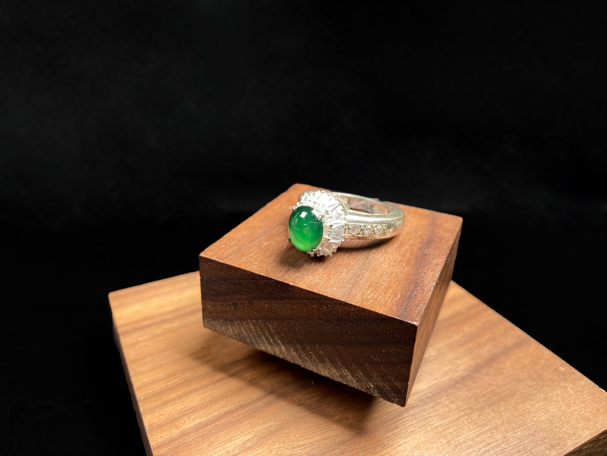 A enchanting imperial green jadeite ring.
