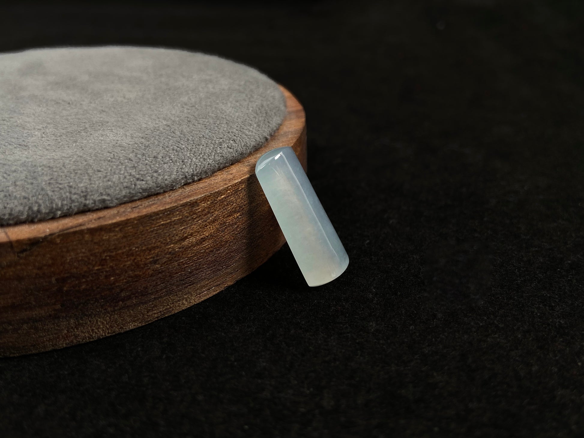 An icy smooth "Wu Shi Zhu" jadeite pillar.