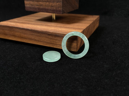 Translucent light green mother-child clasp.