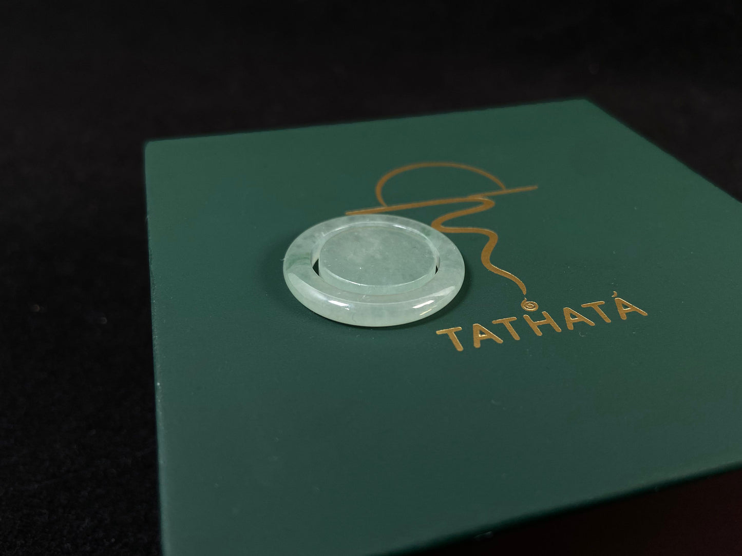 Translucent light green mother-child clasp.