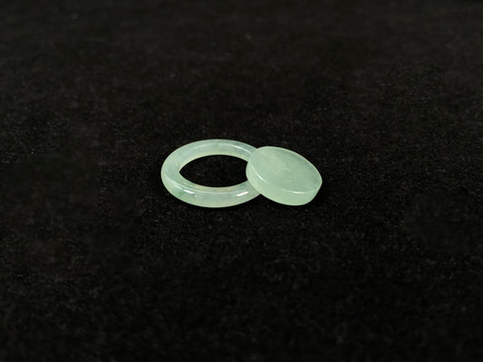 Translucent light green mother-child clasp.
