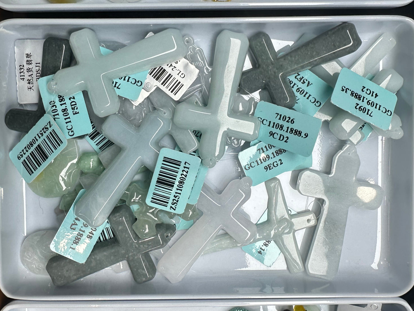 These are jadeite crosses.