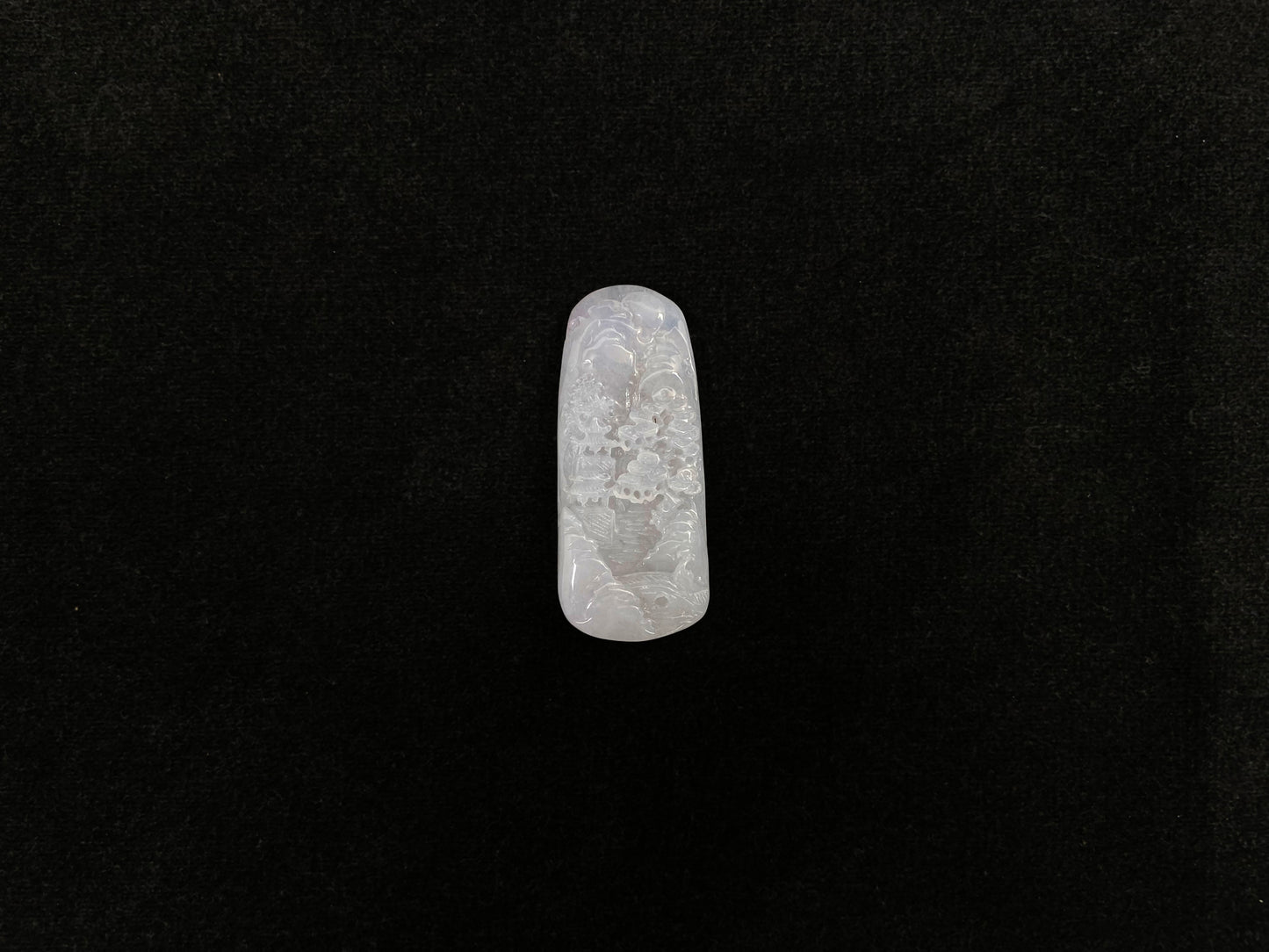 A icy white jadeite landscape plaque.