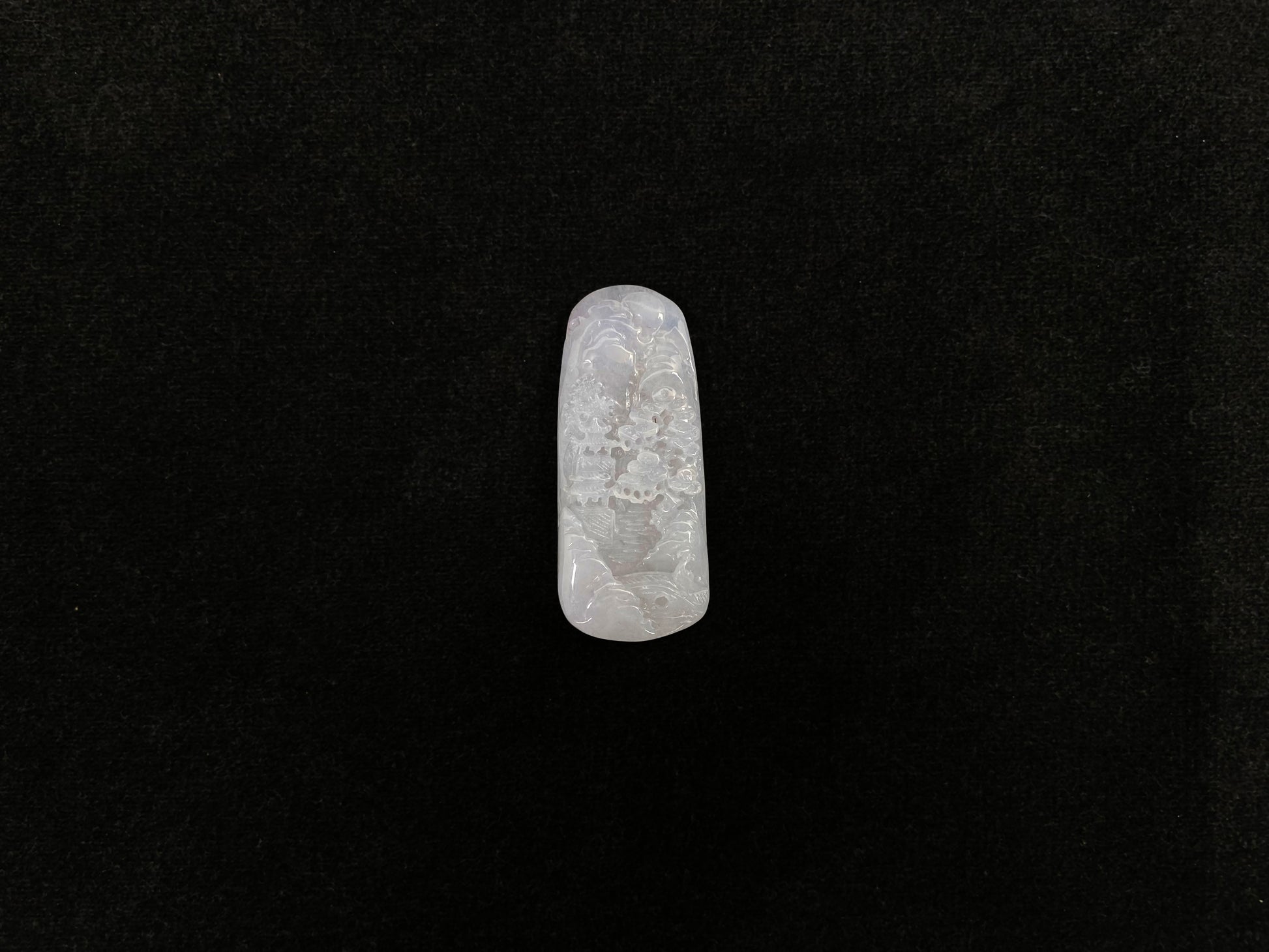 A icy white jadeite landscape plaque.