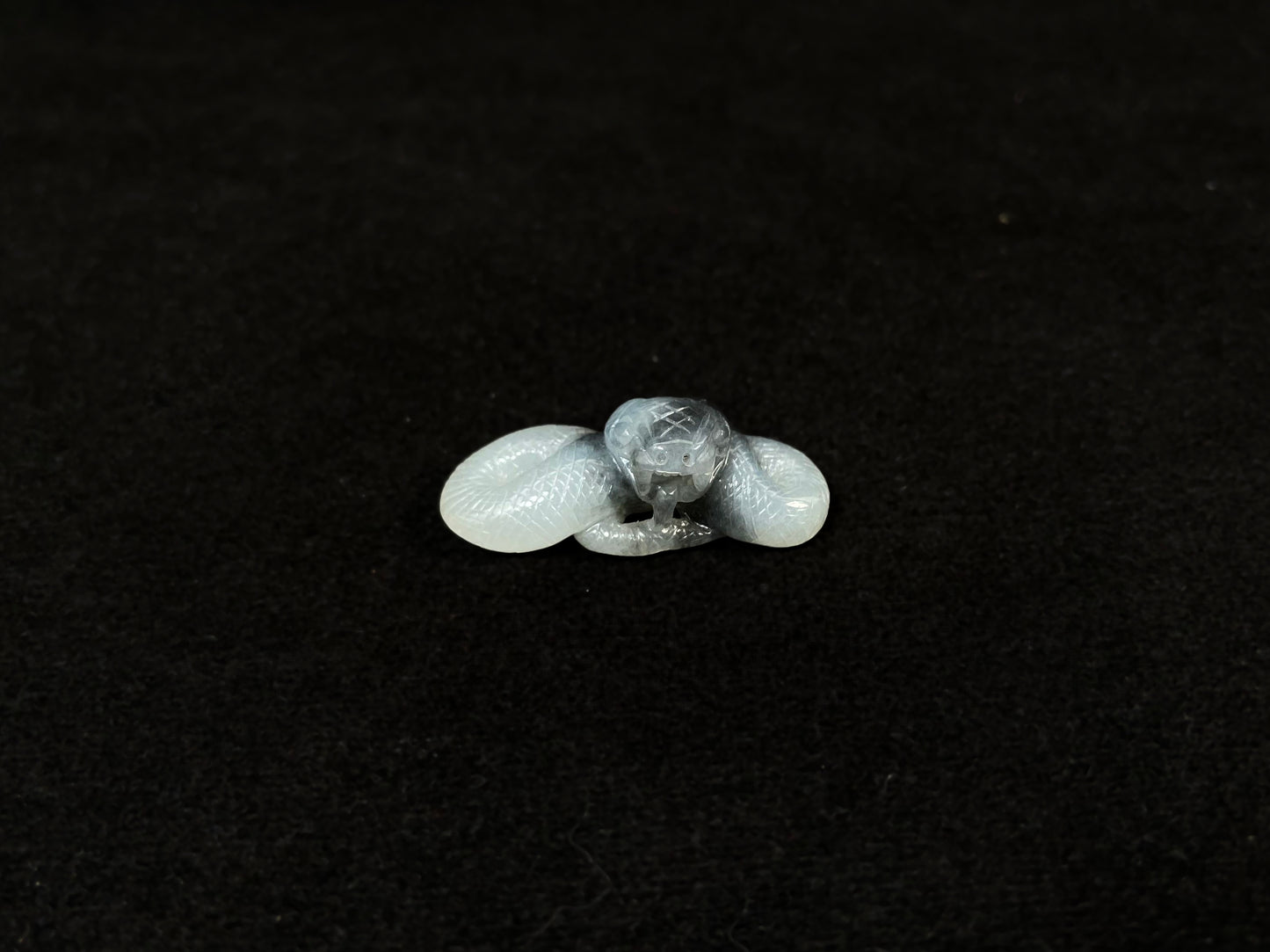 A black and white jade serpent stone.