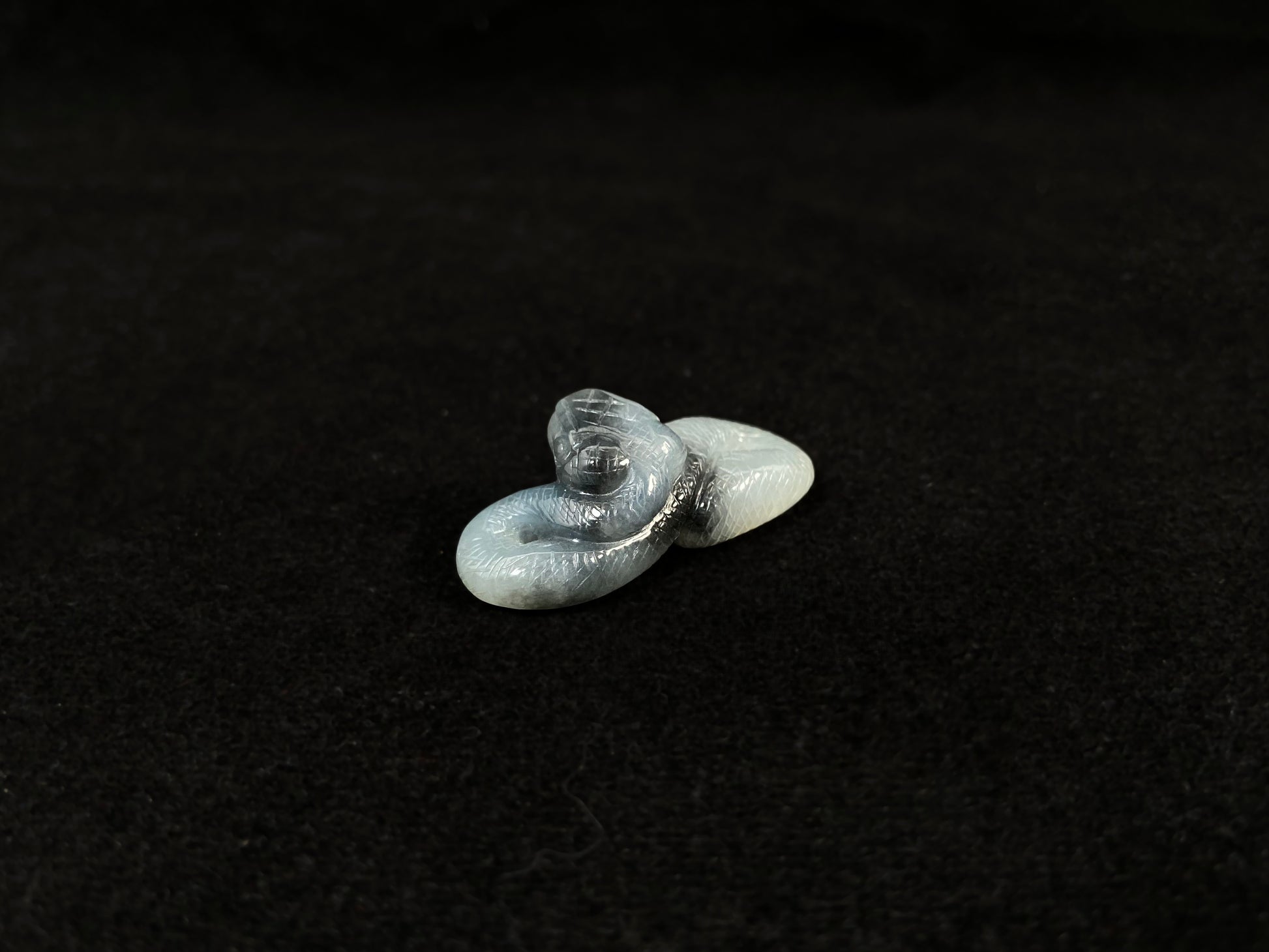 A black and white jade serpent stone.