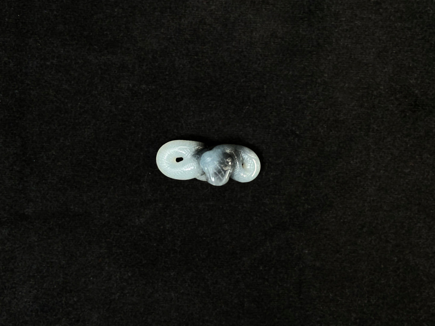 A black and white jade serpent stone.