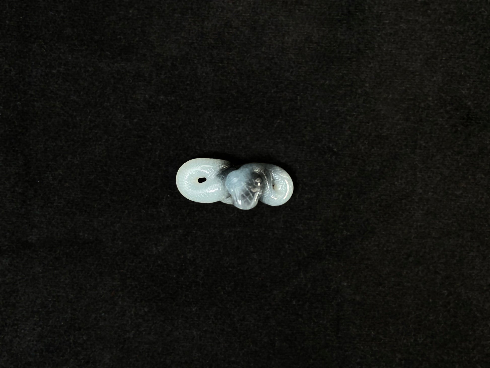 A black and white jade serpent stone.