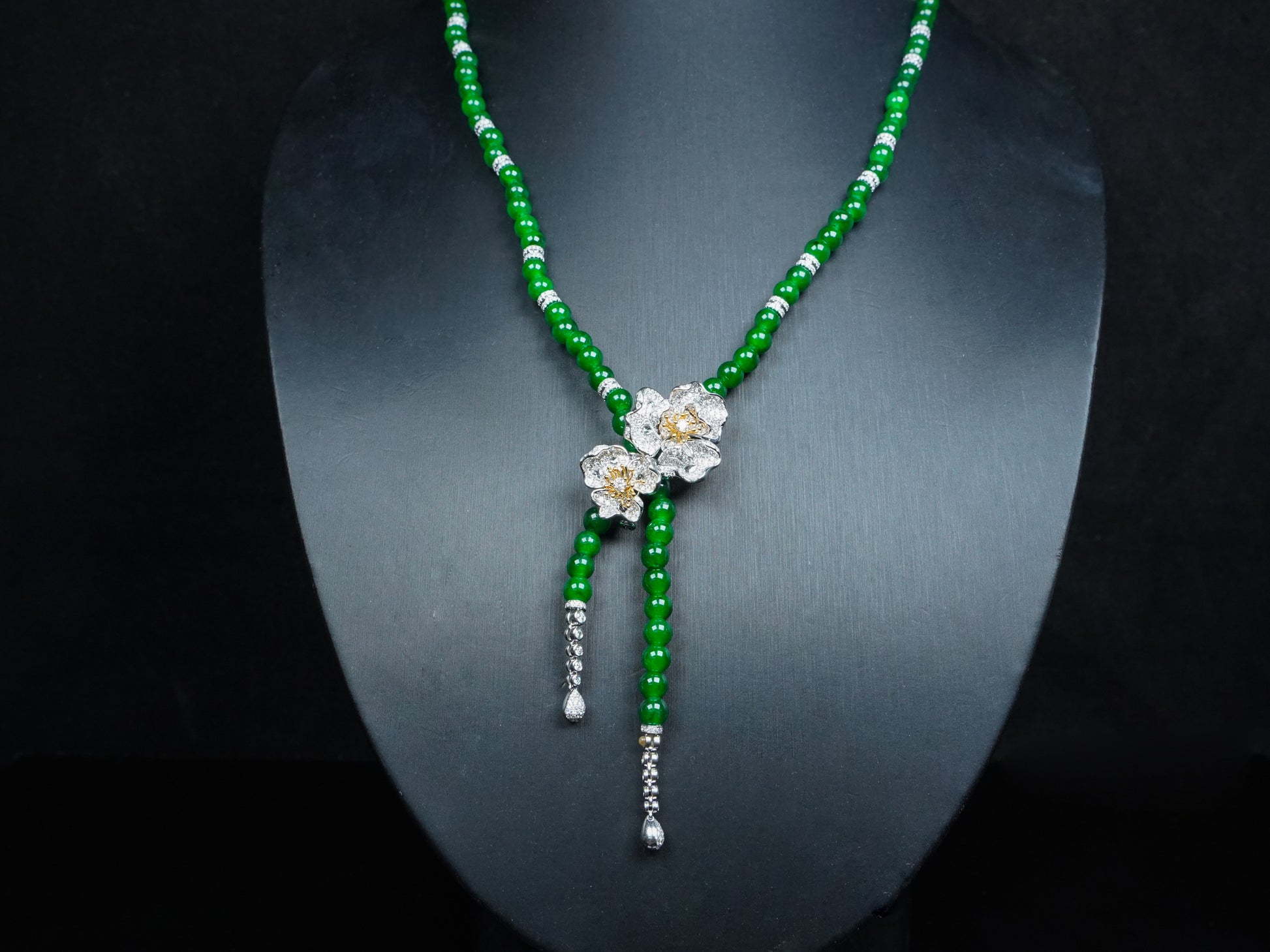 A lush green floral beads jadeite necklace.