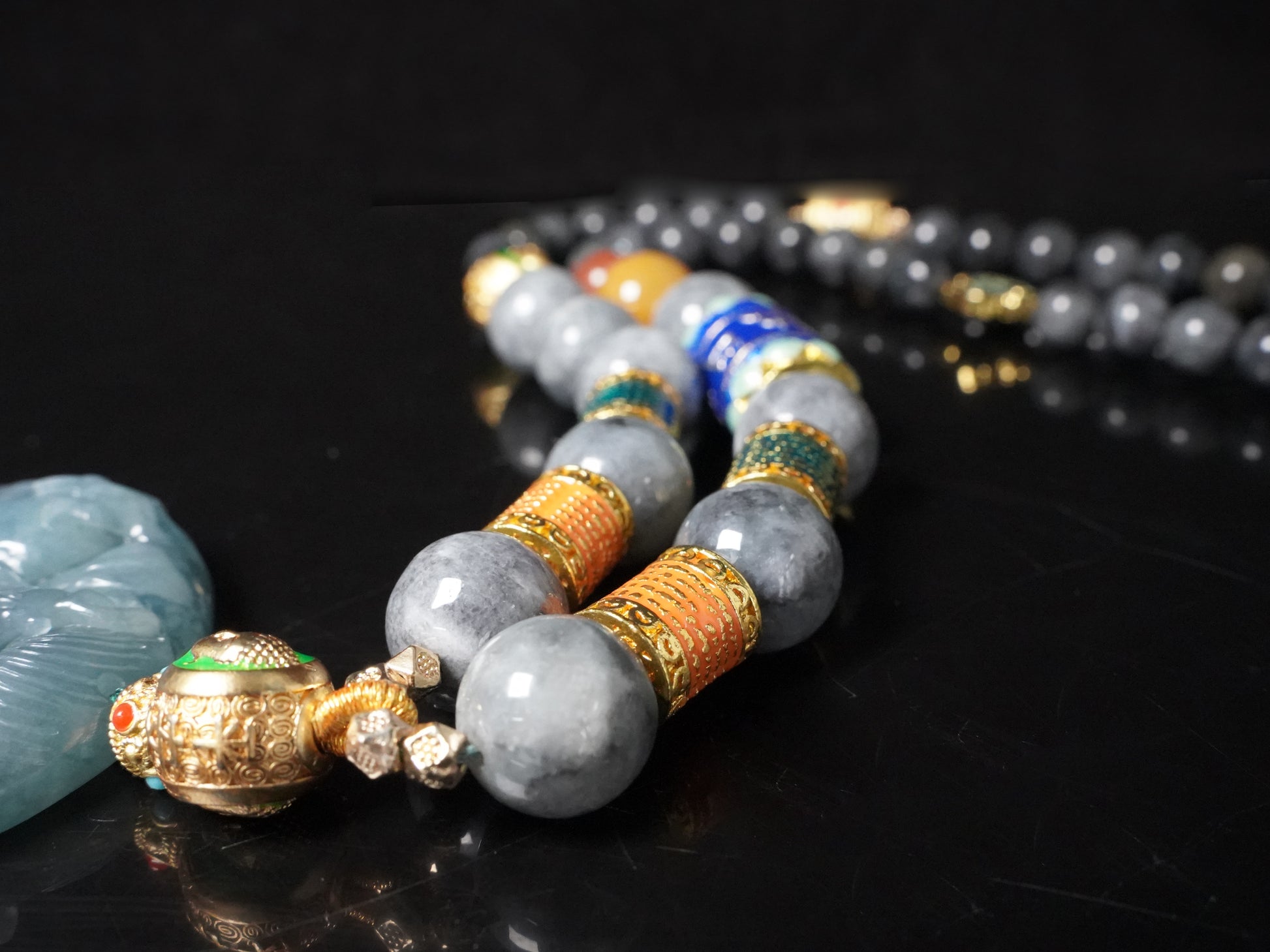 A misty aqua blue dragon beaded chain  jadeite pendant.