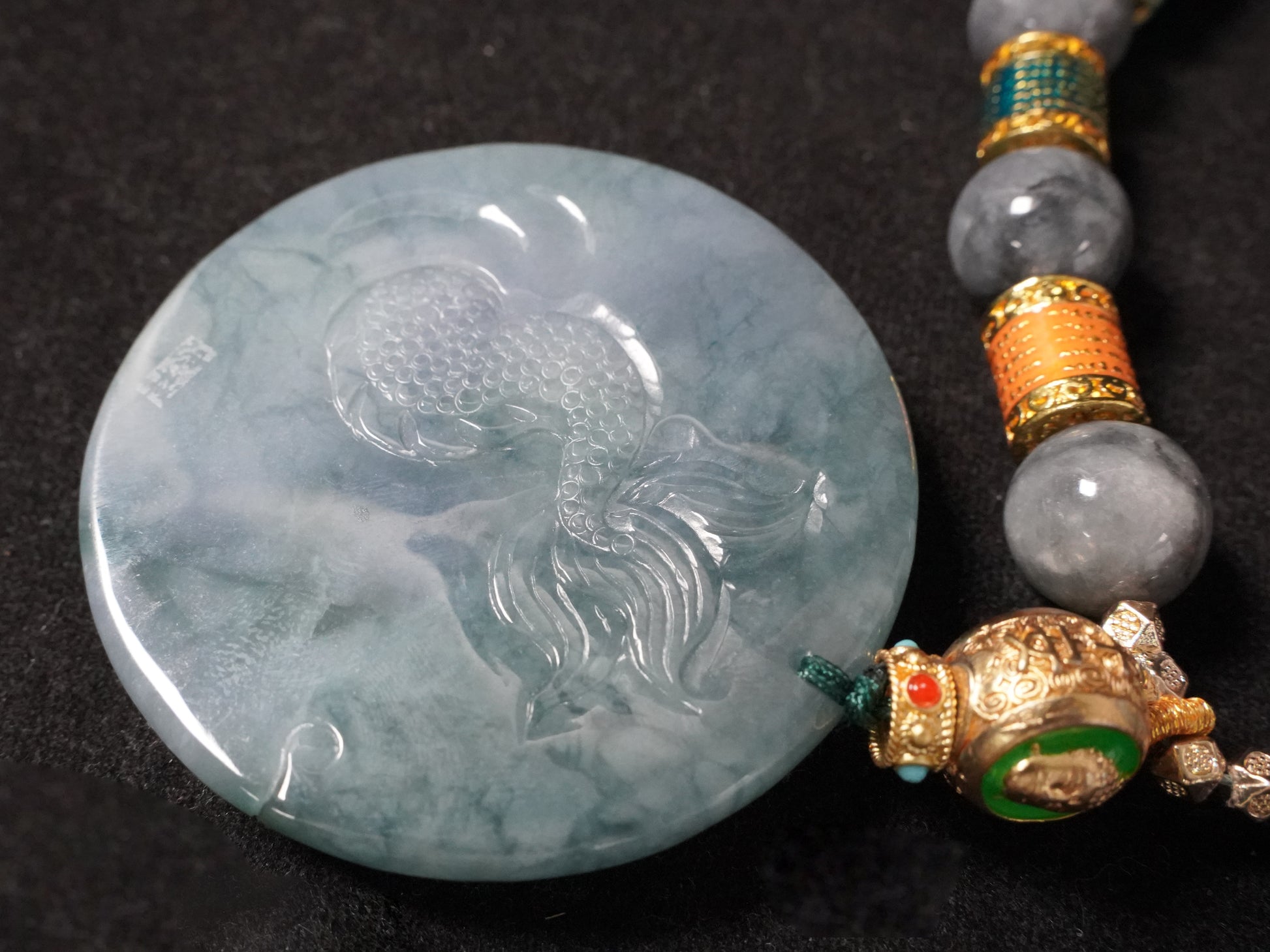 A misty aqua blue dragon beaded chain  jadeite pendant.