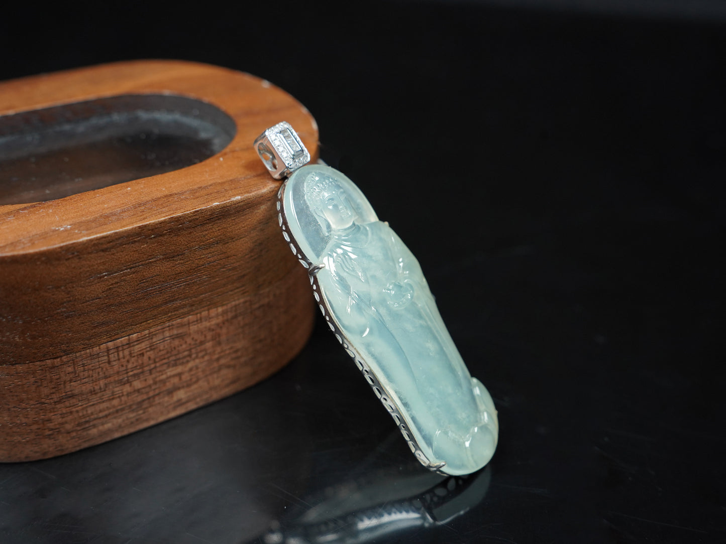 A Icy Pale Green Guanyin Loose Jadeite.