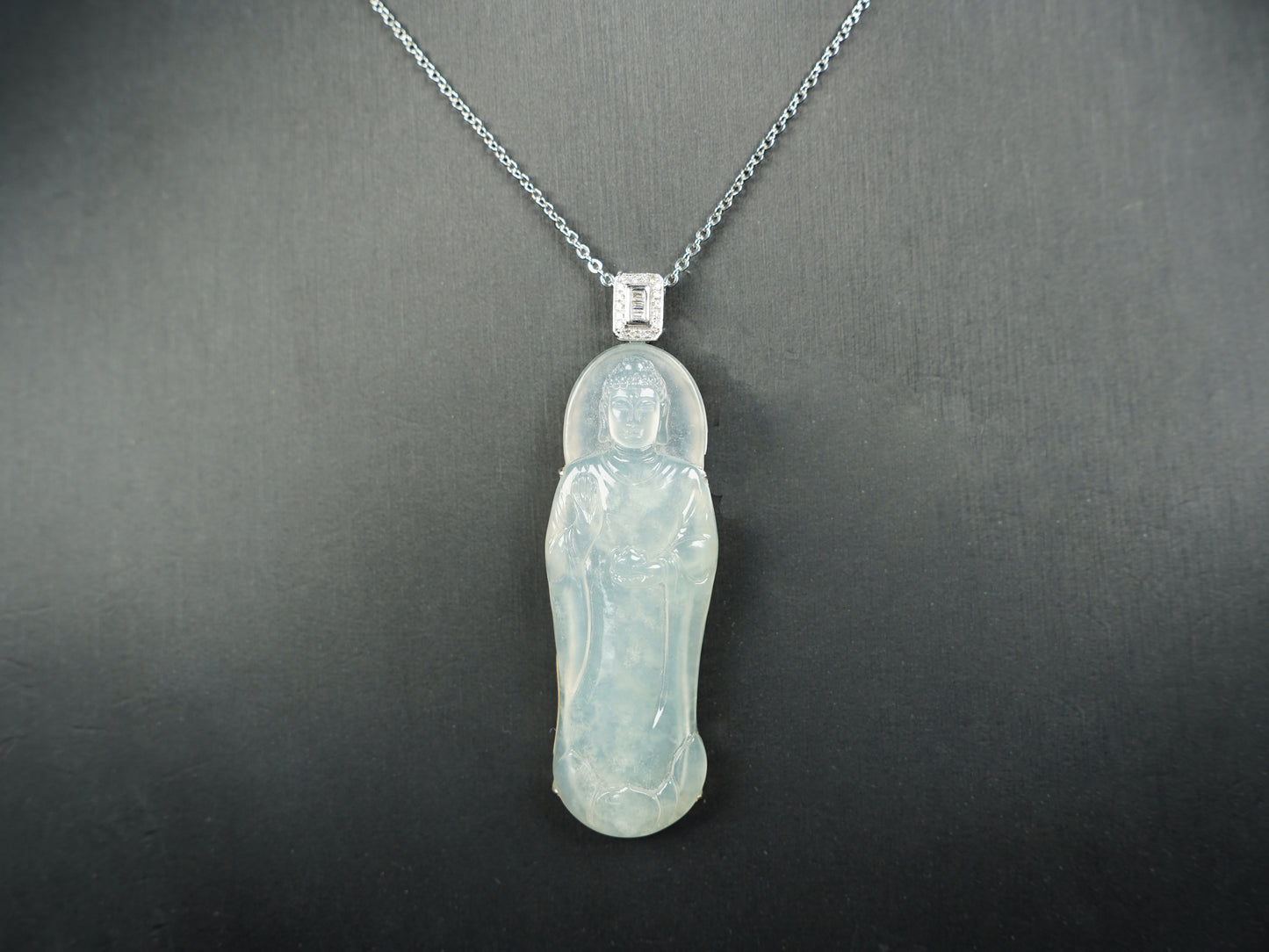 A Icy Pale Green Guanyin Loose Jadeite.