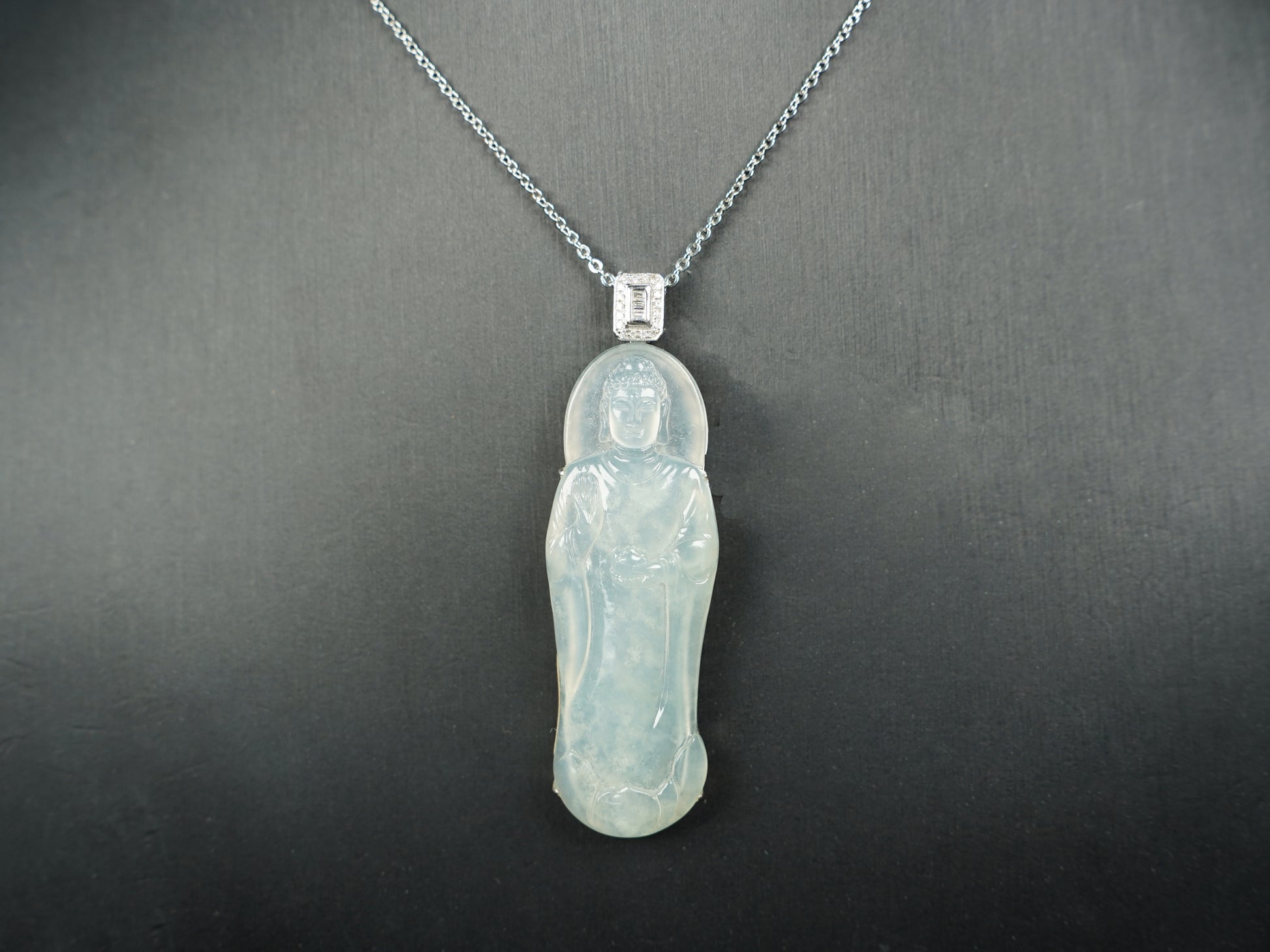 A Icy Pale Green Guanyin Loose Jadeite.