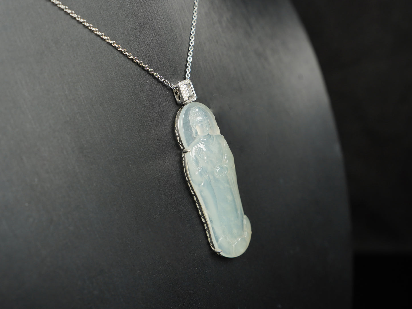 A Icy Pale Green Guanyin Loose Jadeite.