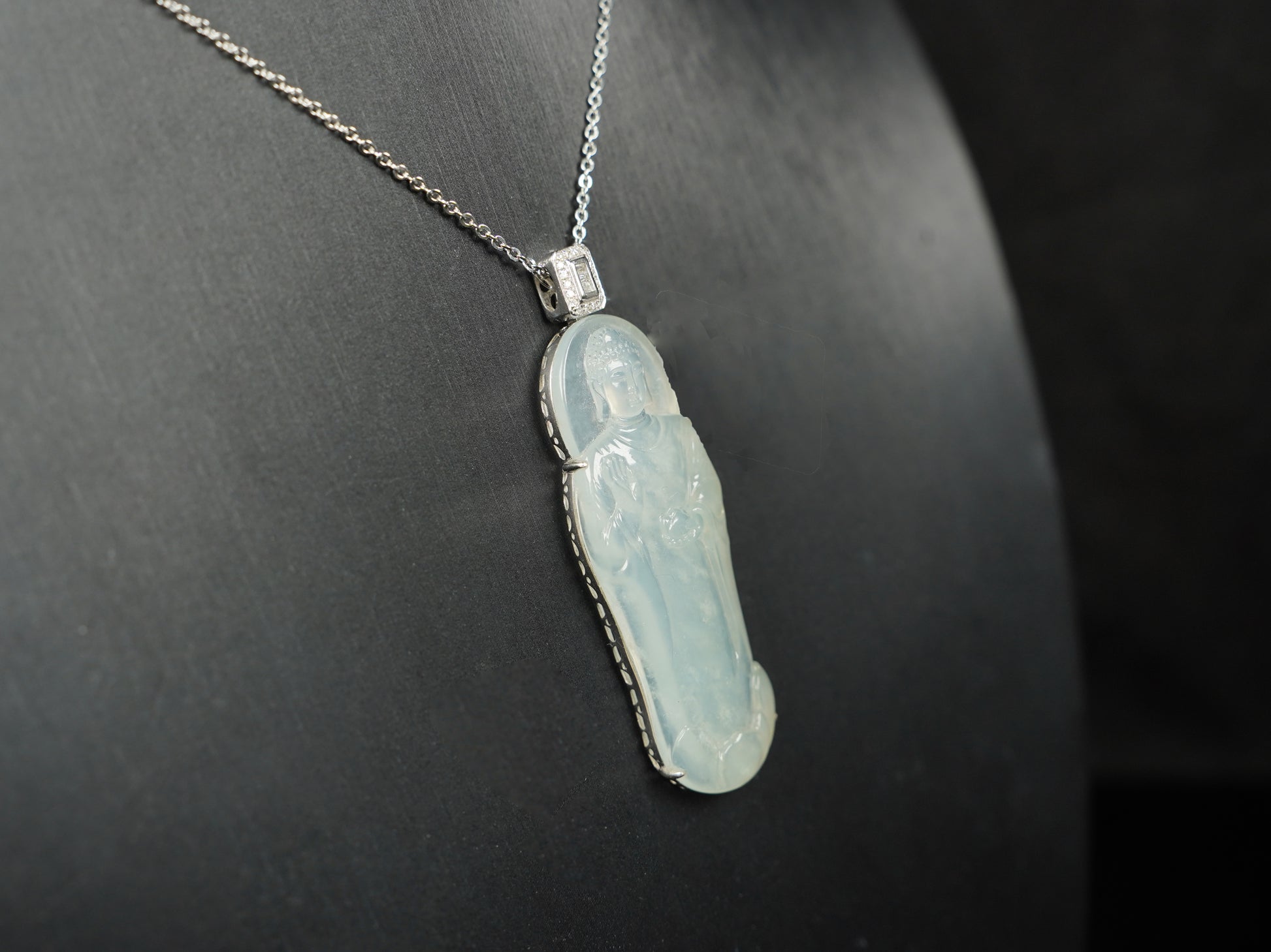 A Icy Pale Green Guanyin Loose Jadeite.