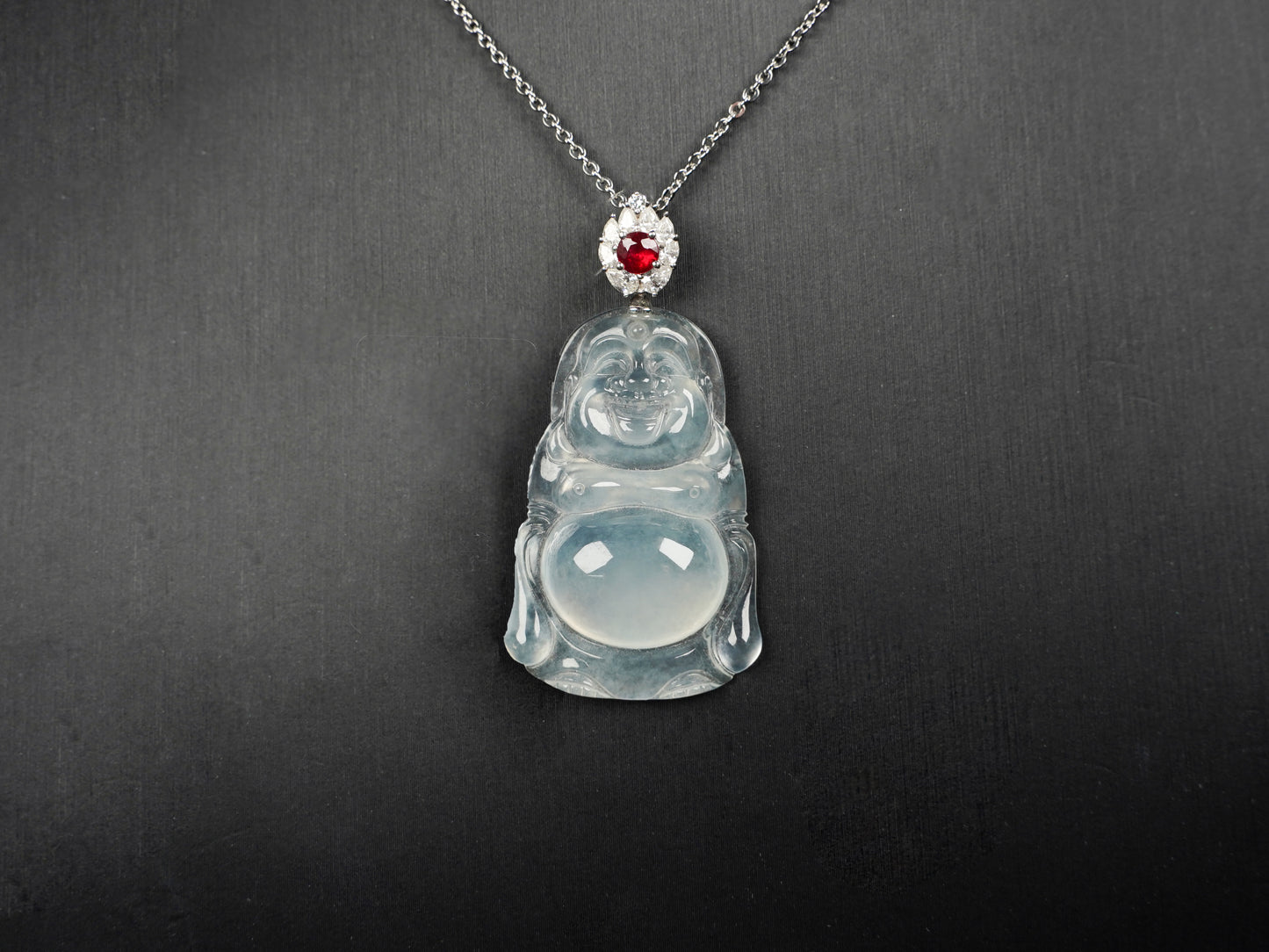 This icy jadeite Buddha pendant.
