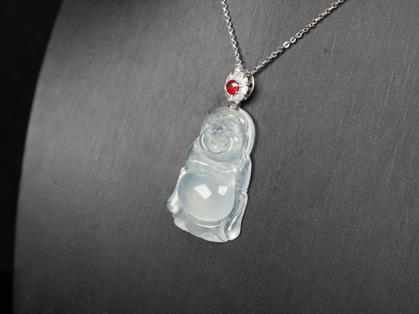 This icy jadeite Buddha pendant.