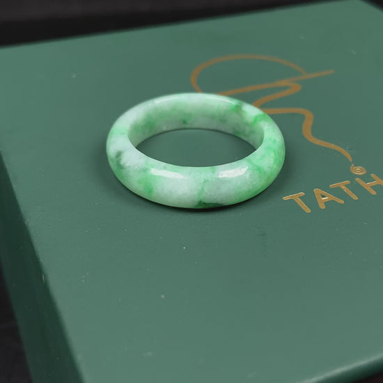 A sloating green soft veil jadeite ring.