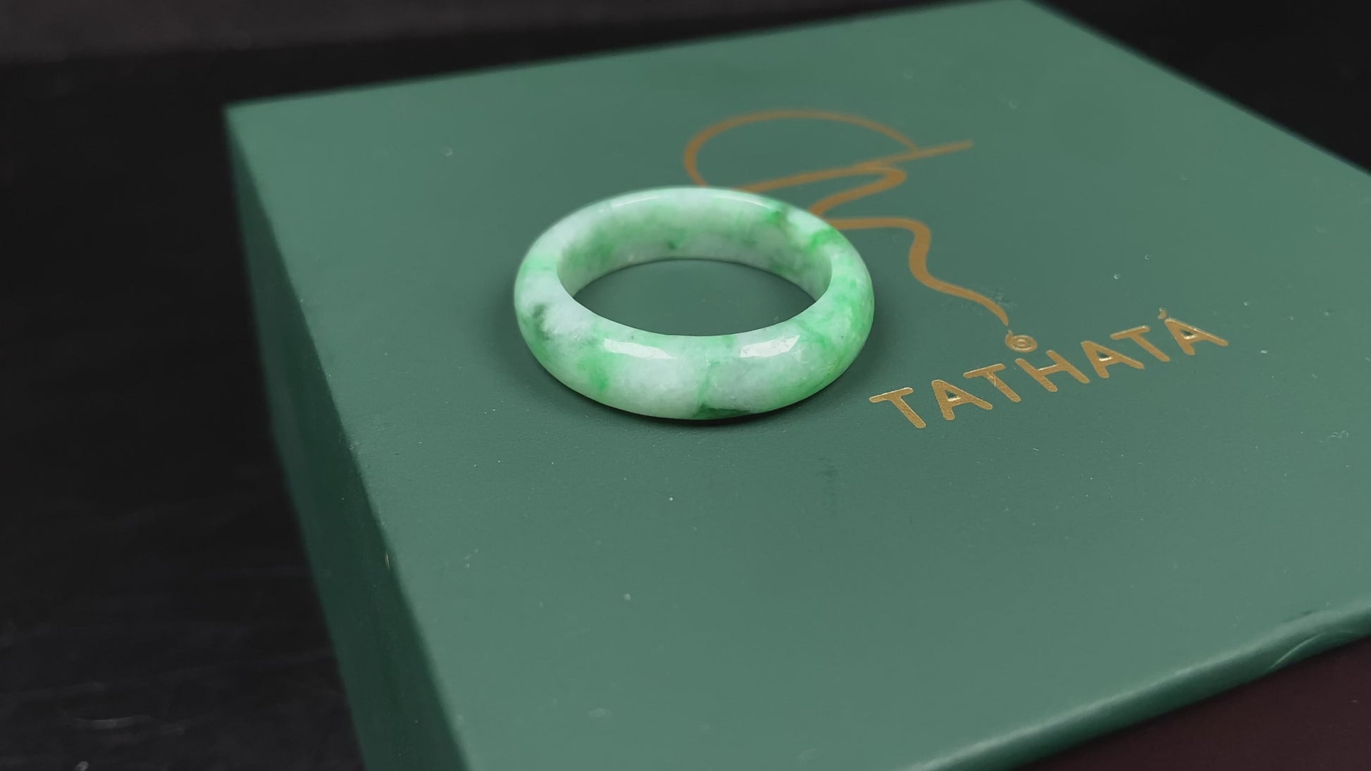A sloating green soft veil jadeite ring.
