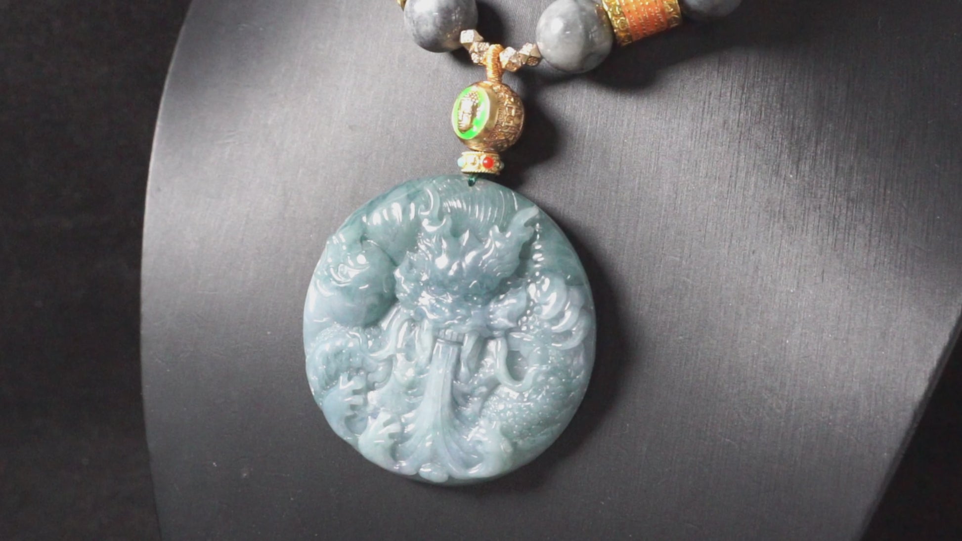 A misty aqua blue dragon beaded chain  jadeite pendant.