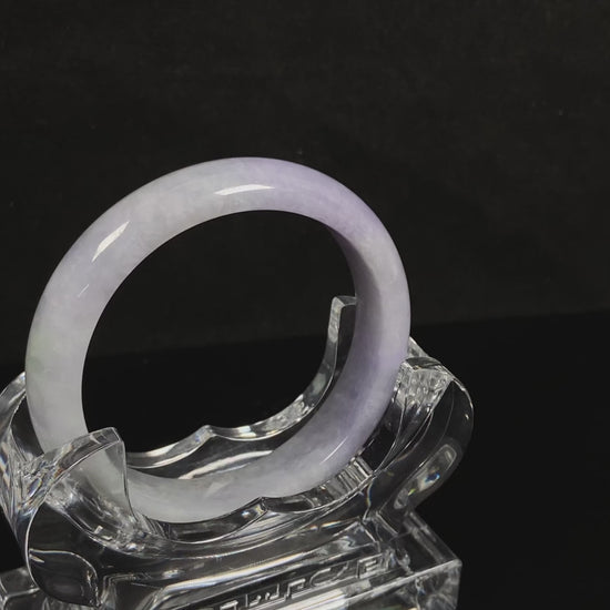 A lilac haze white jadeite bangle.
