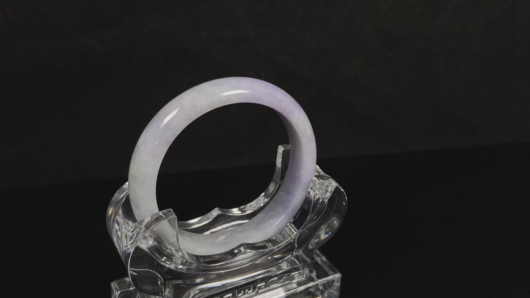 A lilac haze white jadeite bangle.
