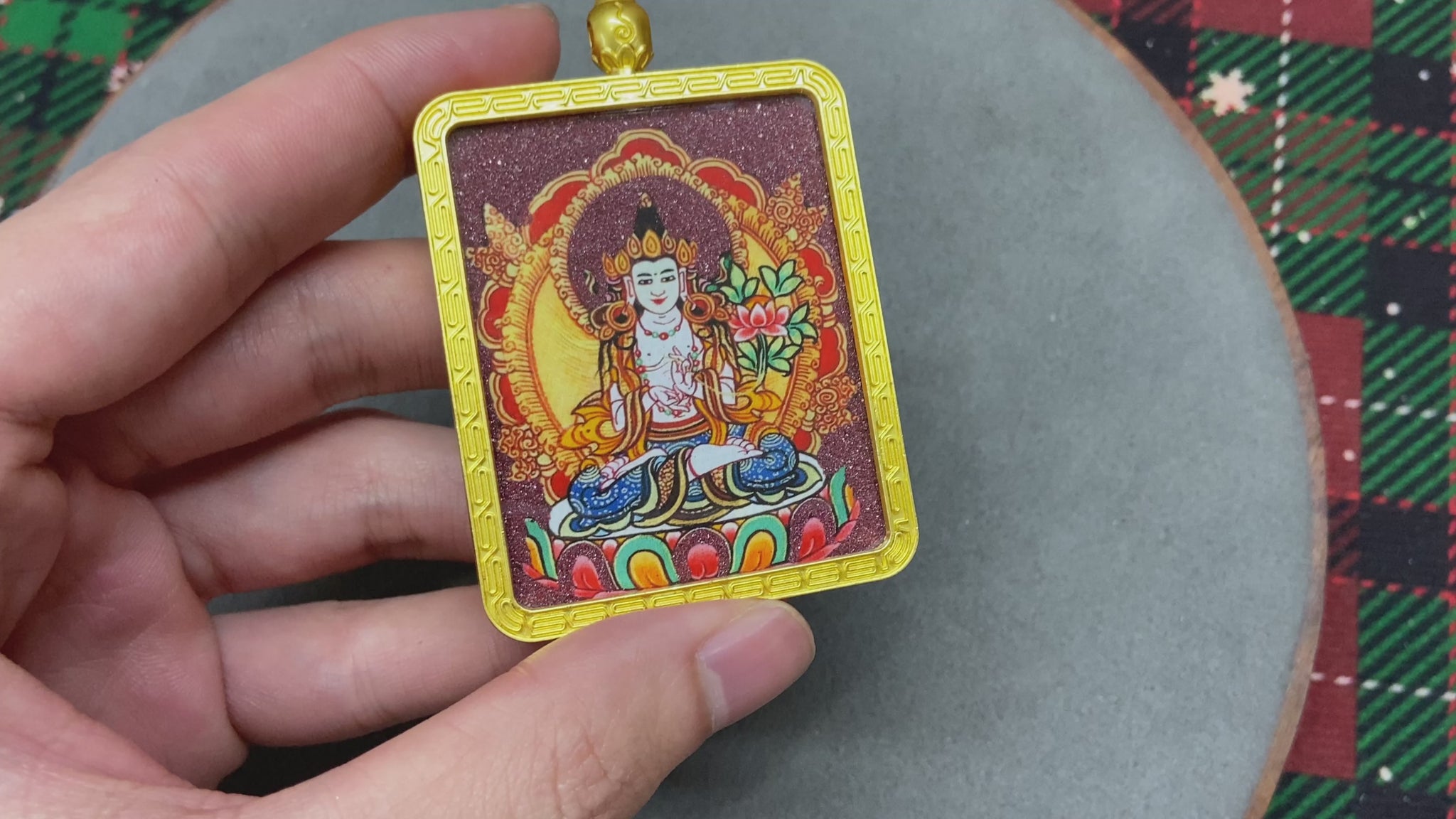 Golden Gawu box with a Thangka of Mahasthamaprapta Bodhisattva inside.