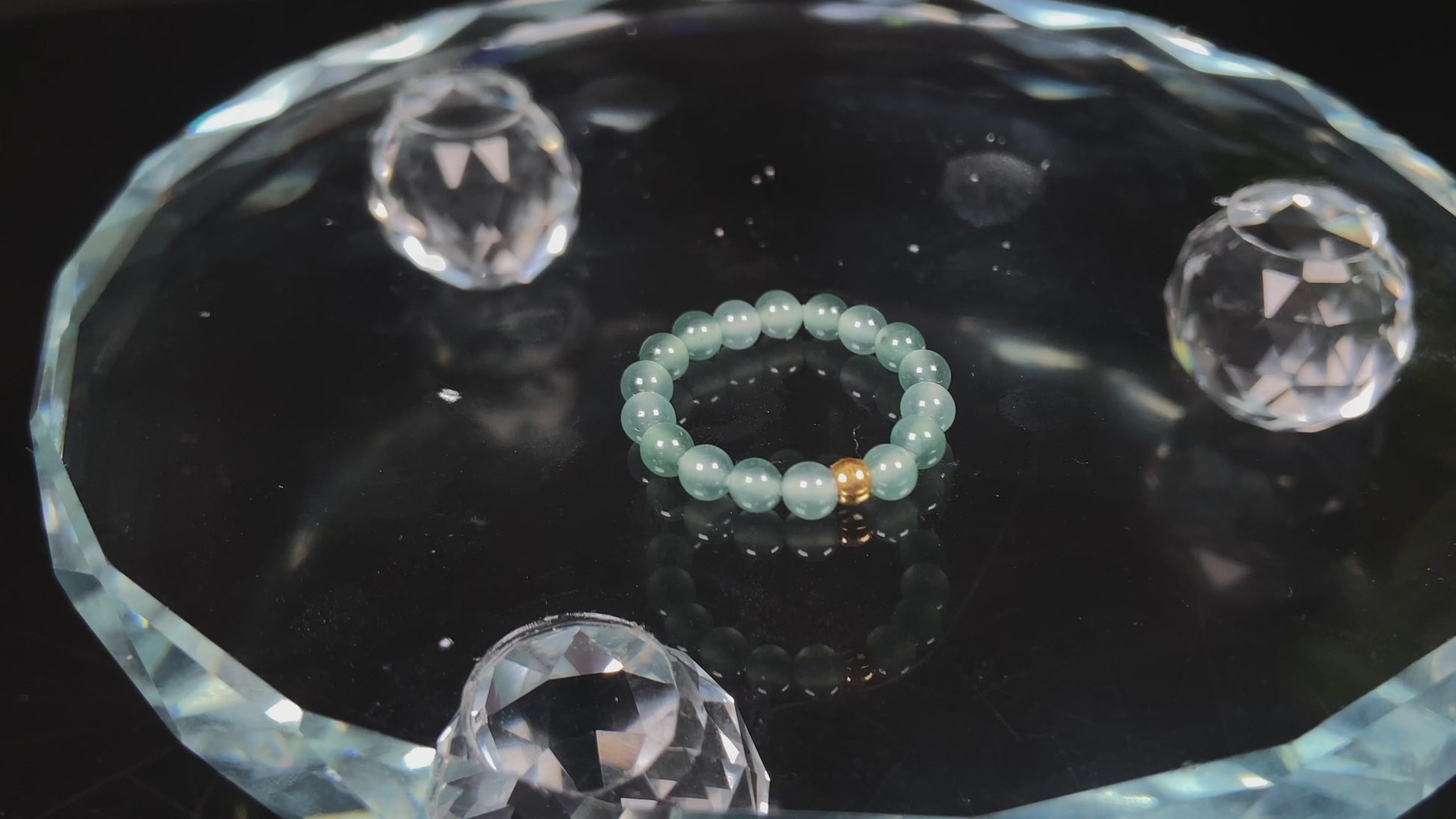 A gold center glacier blue jadeite ring.