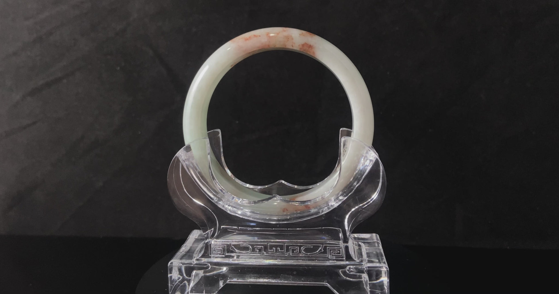 A pale spring green mist jadeite bangle.