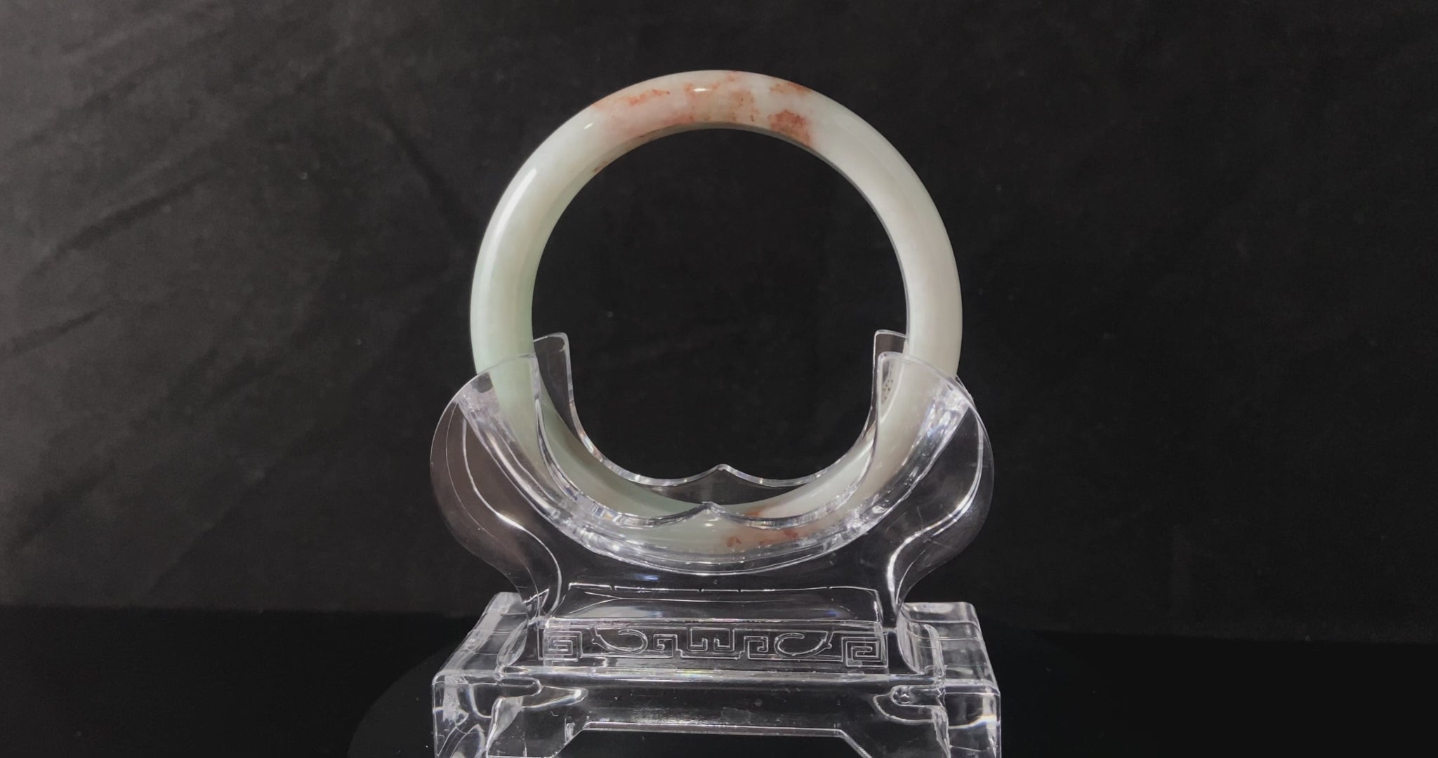 A pale spring green mist jadeite bangle.