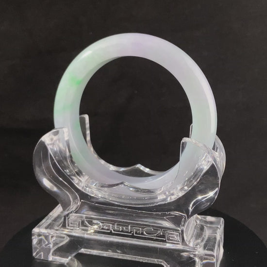 A mist lilac spring green jadeite bangle.