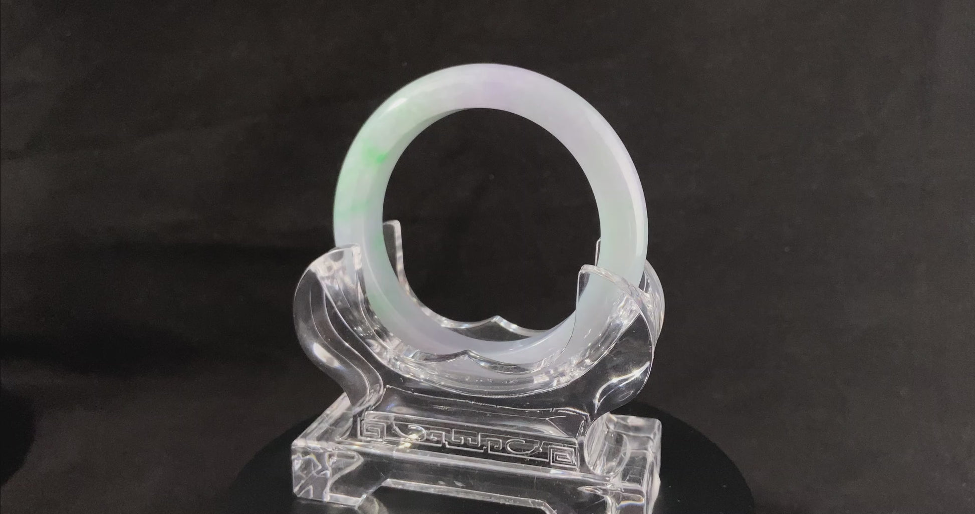 A mist lilac spring green jadeite bangle.