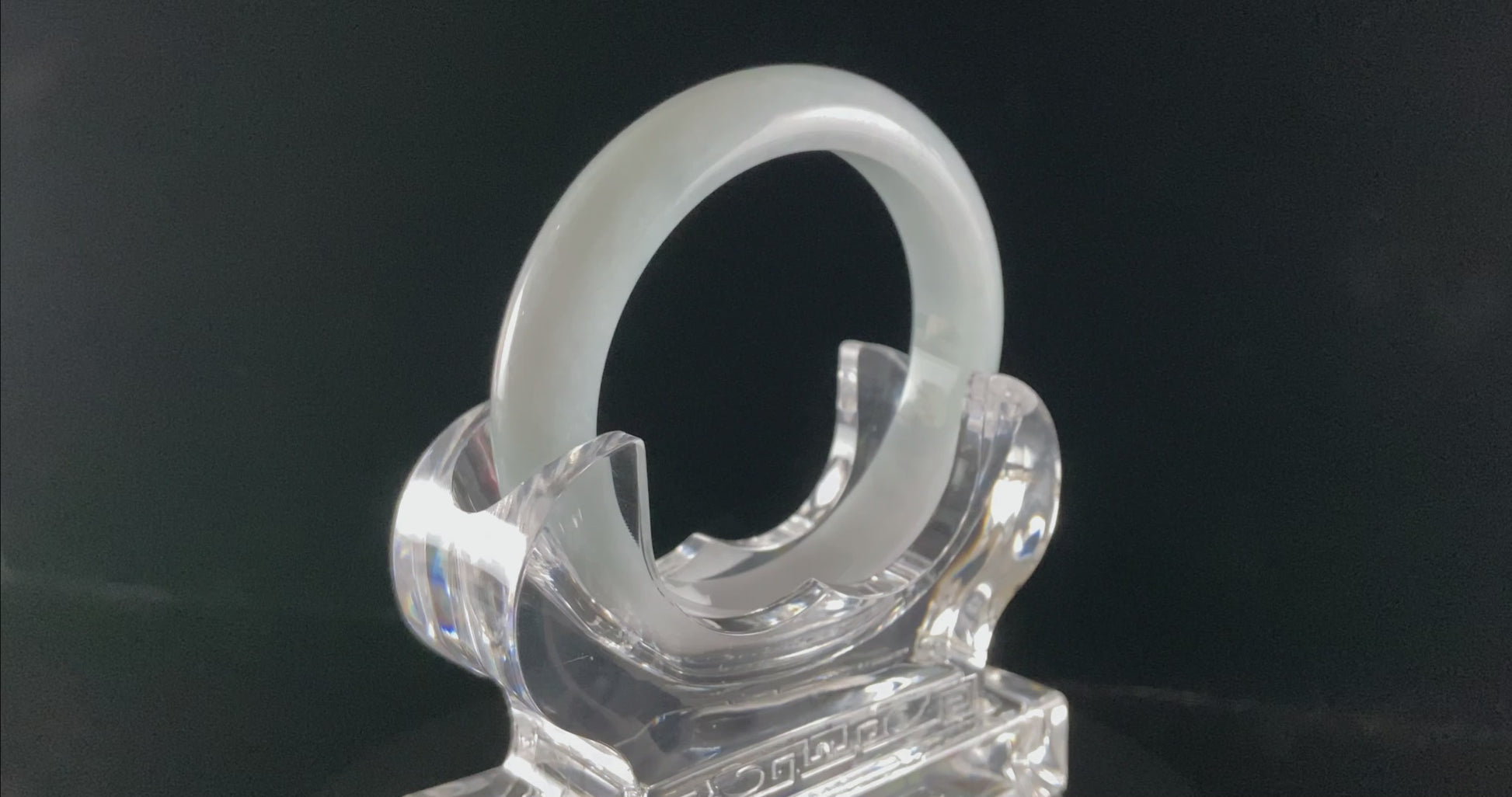 A sky blue mist jadeite bangle.