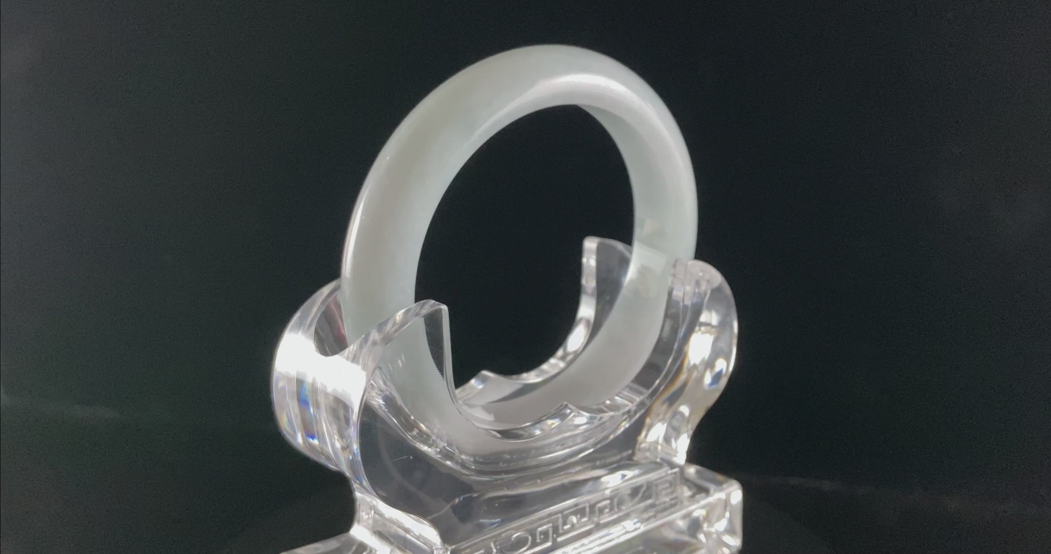 A sky blue mist jadeite bangle.