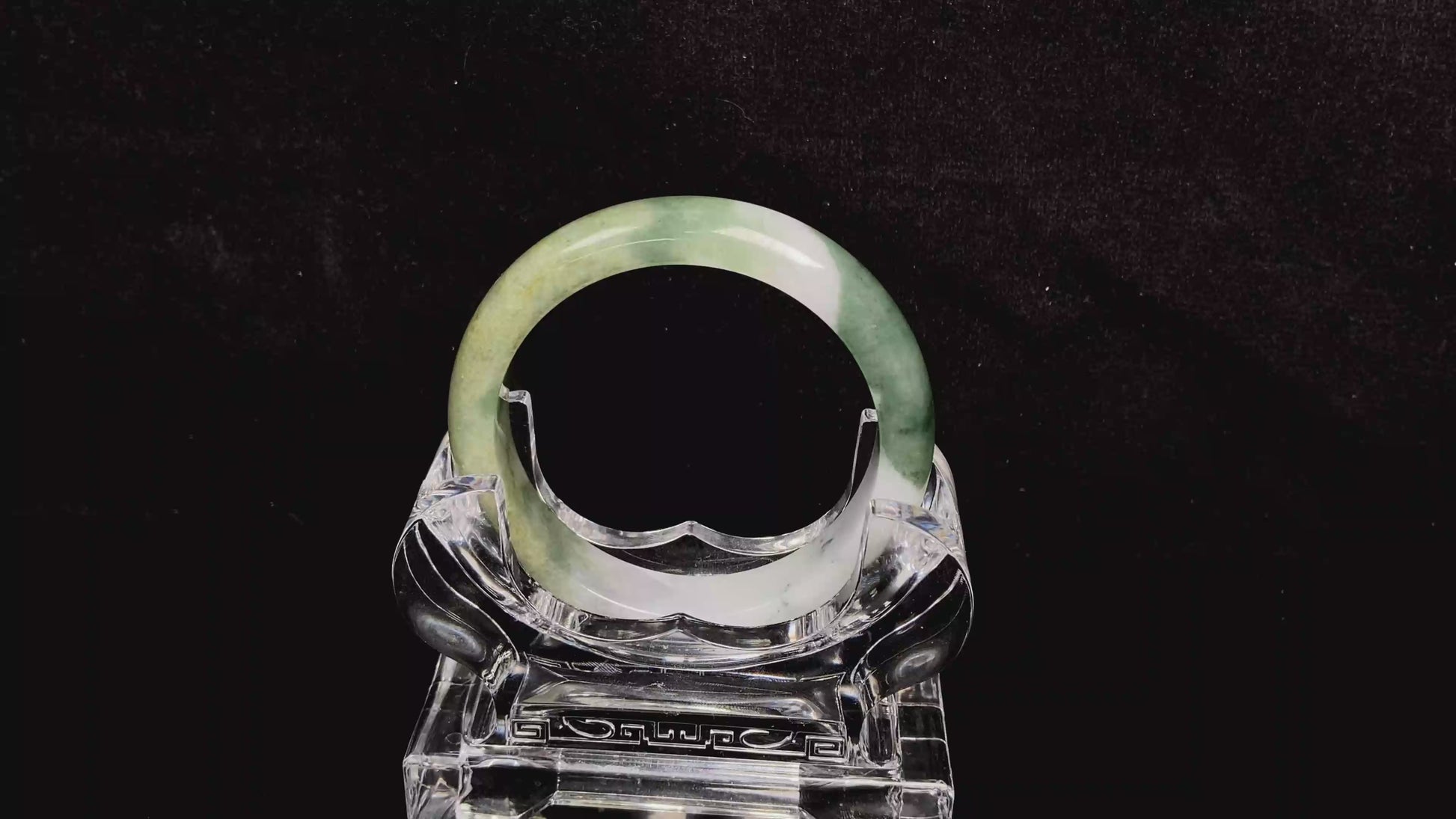 A verdant gold silken white  jadeite bangle.