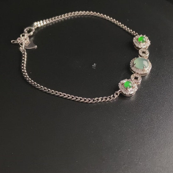 A green aqua fortune link jadeite  bracelet.
