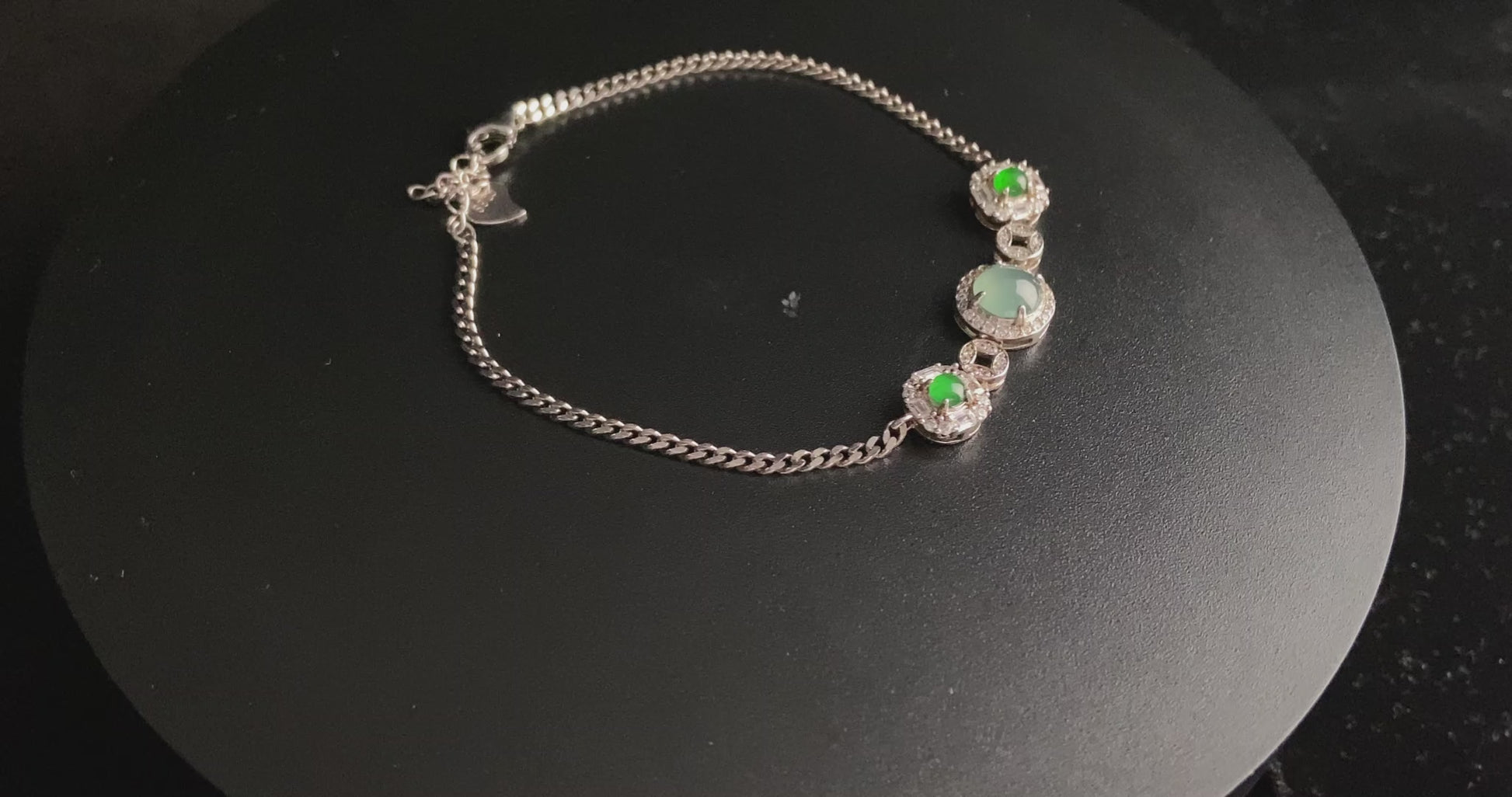 A green aqua fortune link jadeite  bracelet.