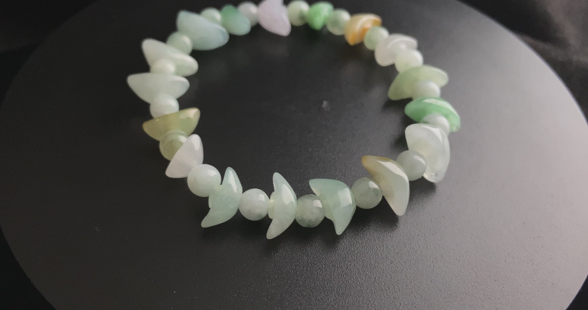 A multicolor wealth Yuanbao jadeite beads bracelet.