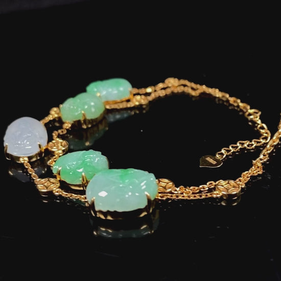 This bracelet is made with white Pixiu and green jadeite Pixiu.