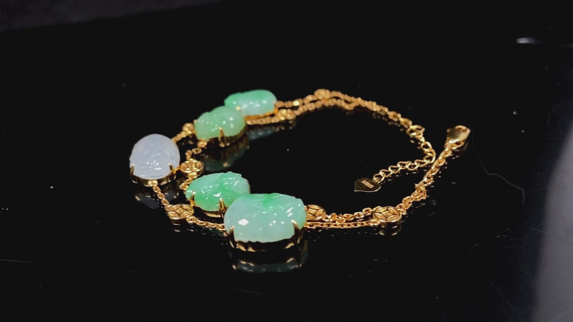 This bracelet is made with white Pixiu and green jadeite Pixiu.