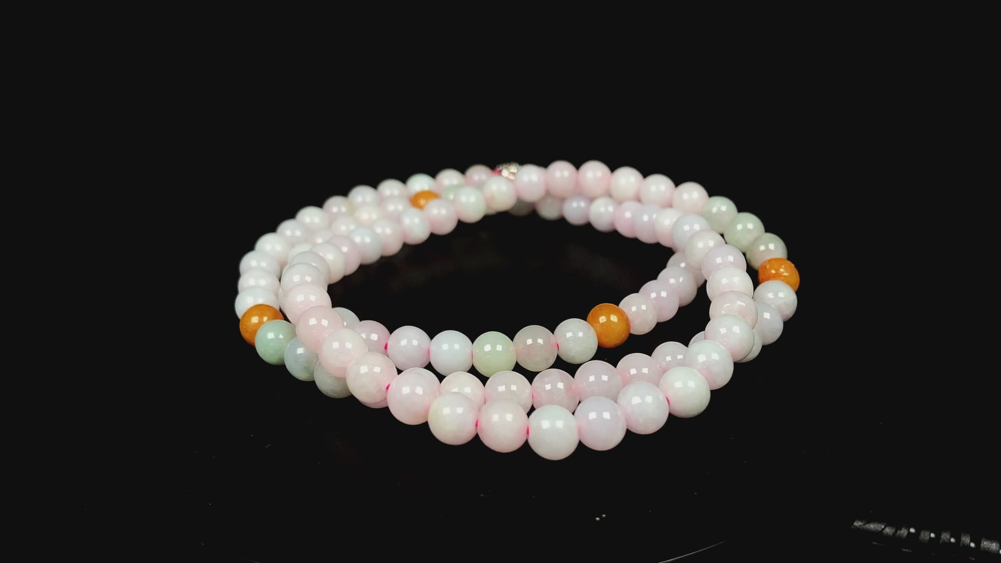 A honey and milky white harmony jadeite beads necklace.