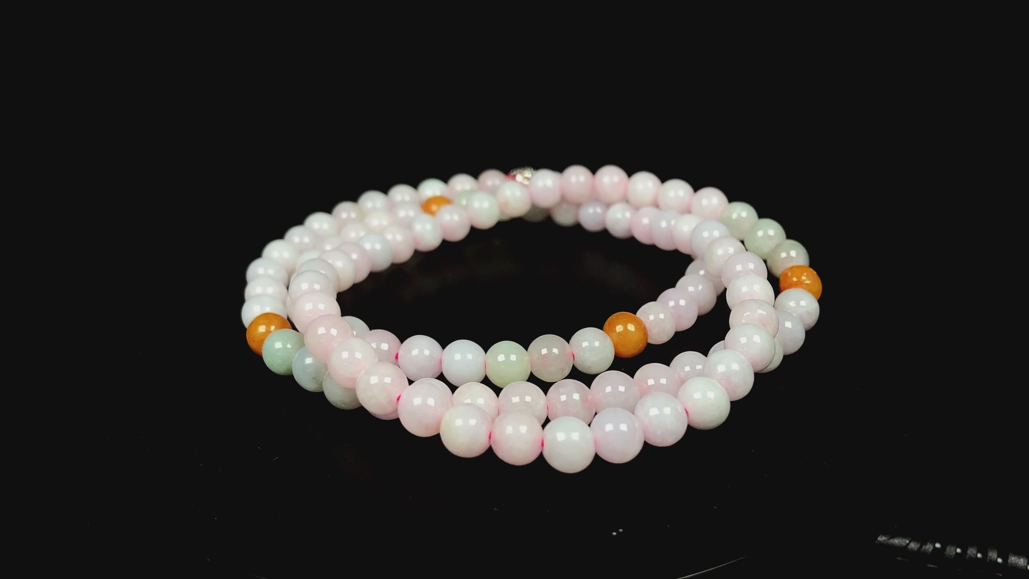 A honey and milky white harmony jadeite beads necklace.