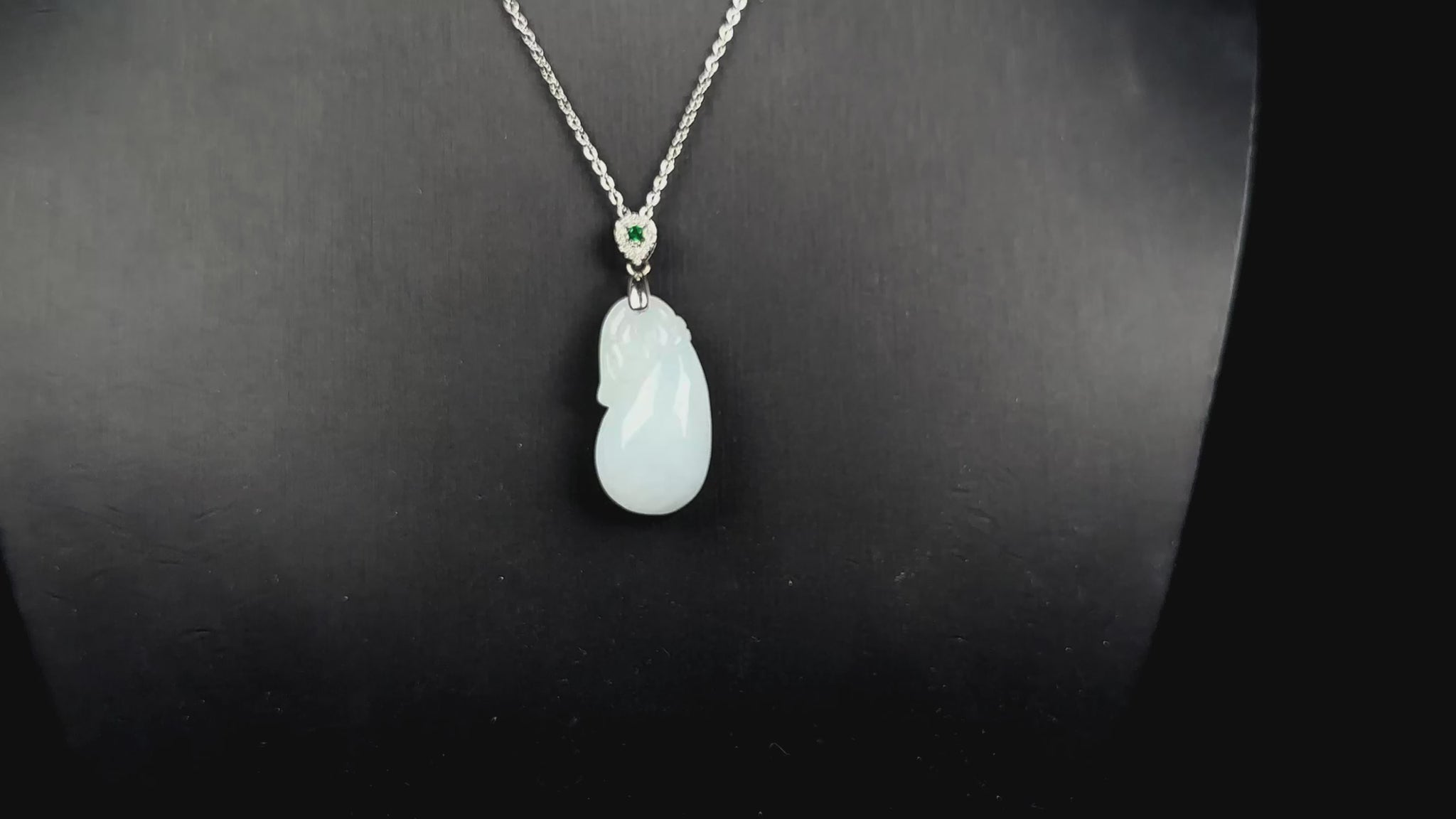 A pure white pouch jadeite pendant.