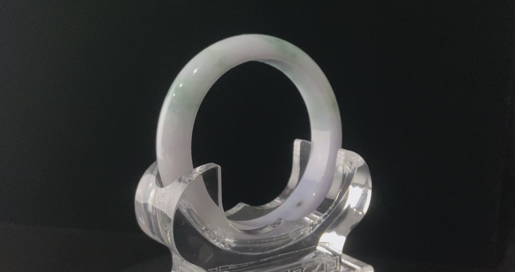 A lavender cloud Blue veil jadeite bangle.