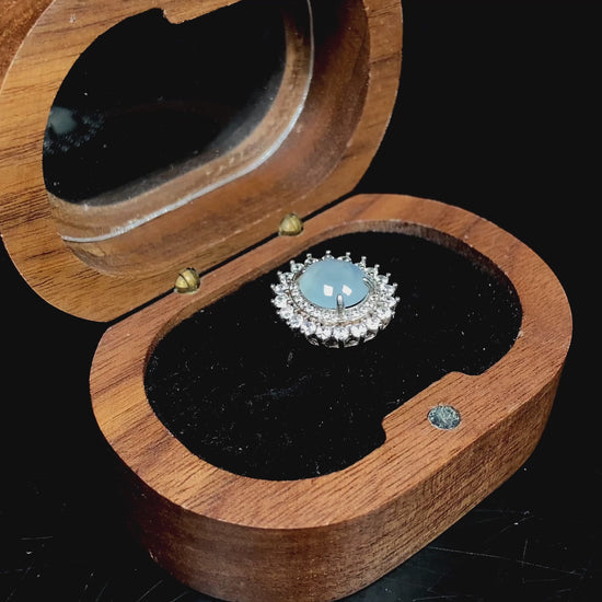 A pale blue moon glow jadeite ring.