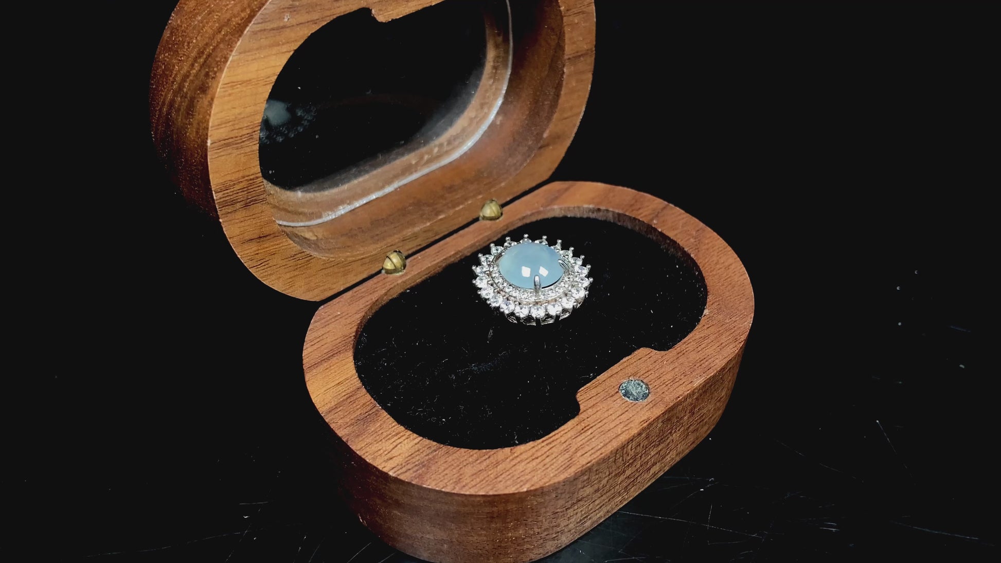 A pale blue moon glow jadeite ring.