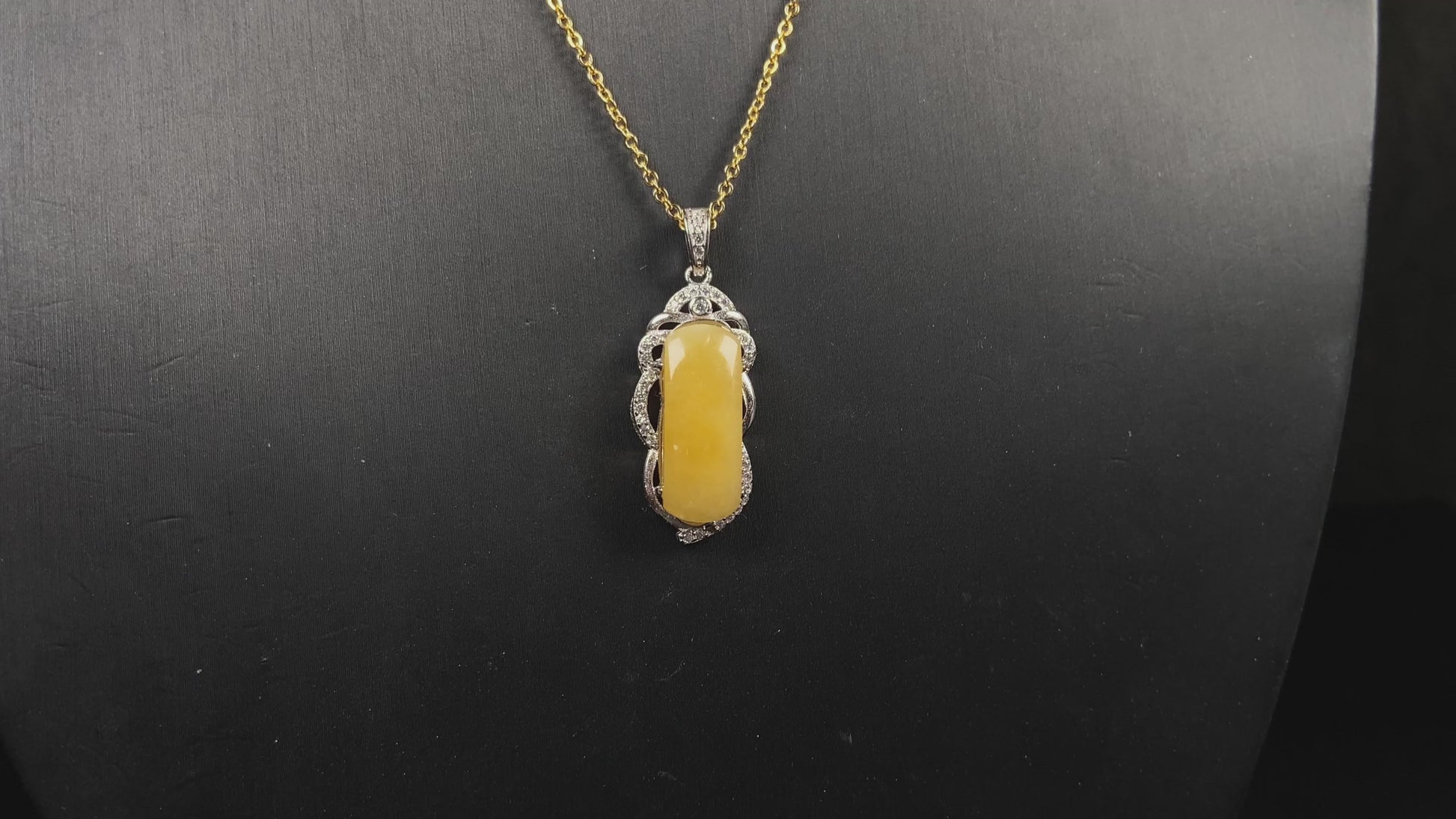 A gentle wheat yellow jadeite pendant.